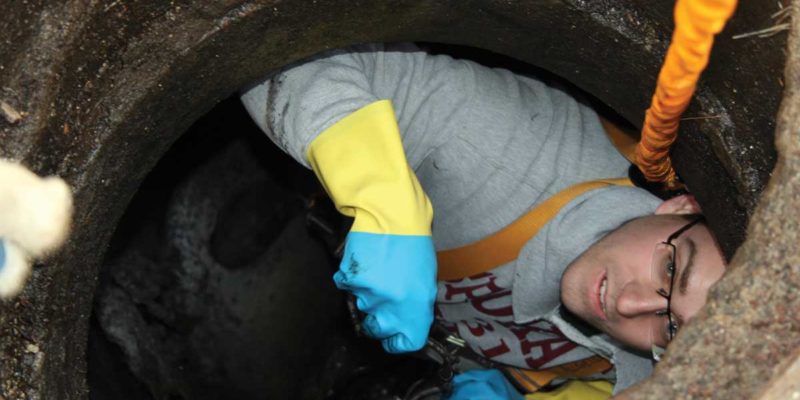 Down & dirty: As far as Brandon Freeman is concerned, sewer diving is a dream job