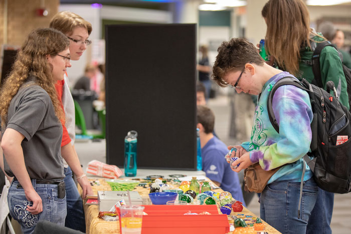 Students visiting during library celebration